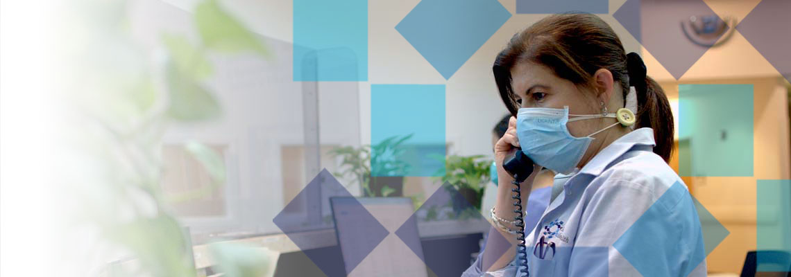 working parent on the phone with provider