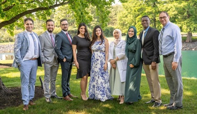 2025 JFK Internal Medicine Residency graduates posing together.