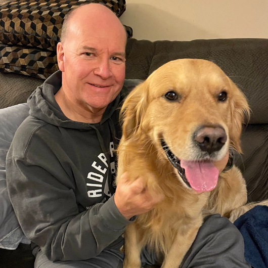 Jim Young and his golden retriever