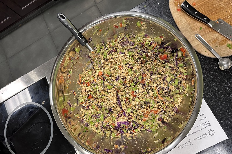 Top view of a large bowl of quinoa edamame salad with ginger dressing.