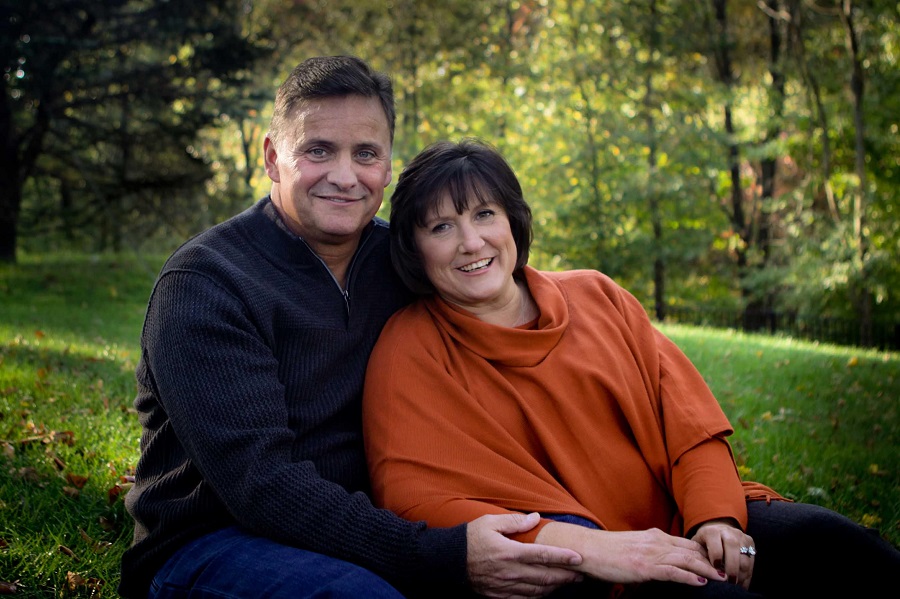 The Hennessys sitting outside